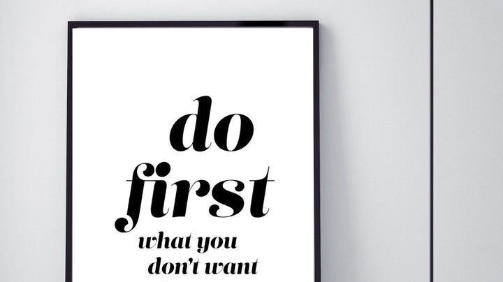Sign that says Do first what you don't want to do the most to convey how to declutter and stay organized