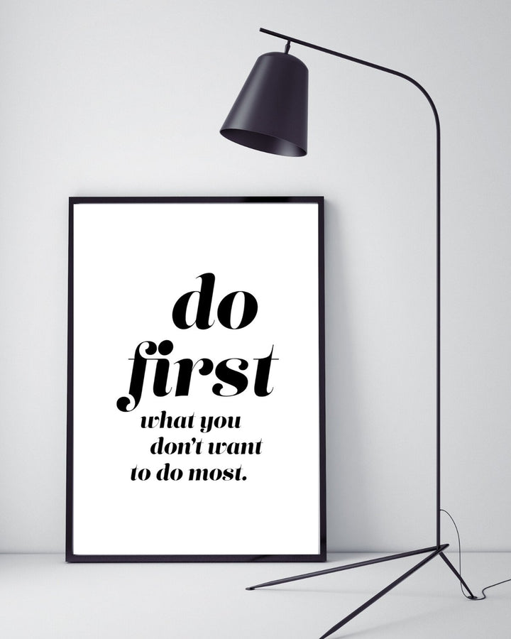 Sign that says Do first what you don't want to do the most to convey how to declutter and stay organized
